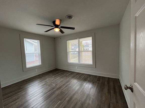 Front bedroom has lots of windows and overlooks the front porch, Ceiling fans in all bedrooms and living rooms.