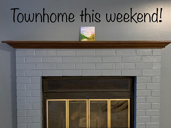 Wood-burning fireplace in main floor living room