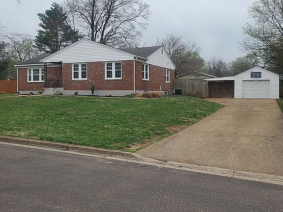 Detached garage and carport