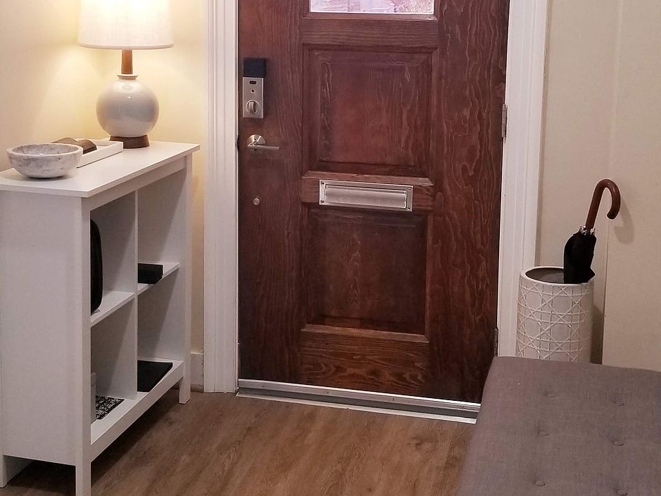 Foyer. Front door has one-way glass