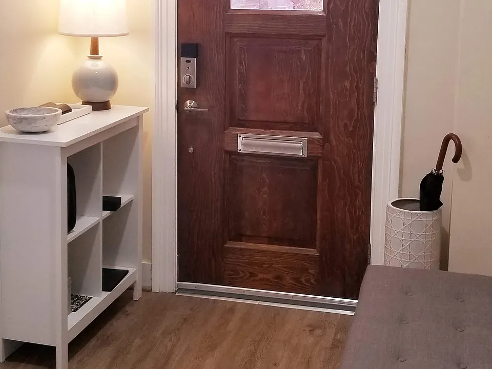 Foyer. Front door has one-way glass