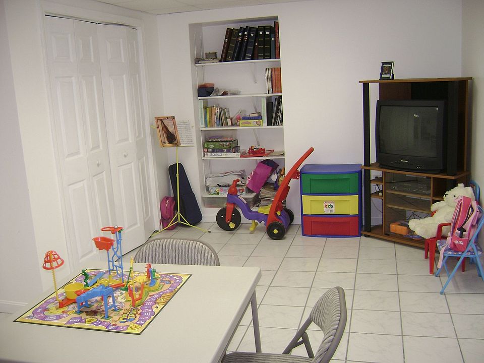 Finished basement has built-ins and plenty of extra space!