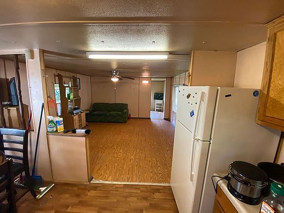 Kitchen with Living Room Bac