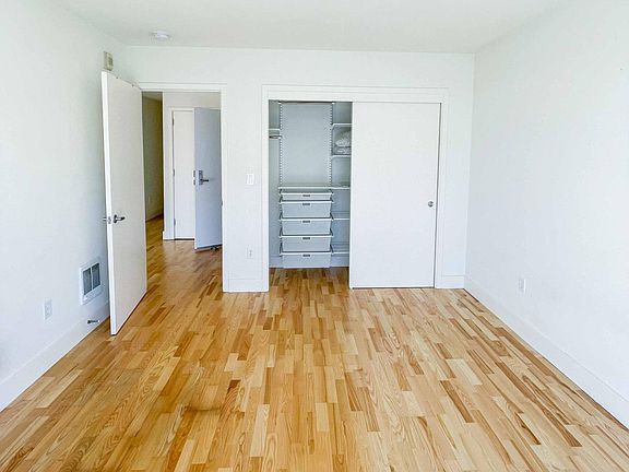 Master bedroom. Custom elfa storage system shown.