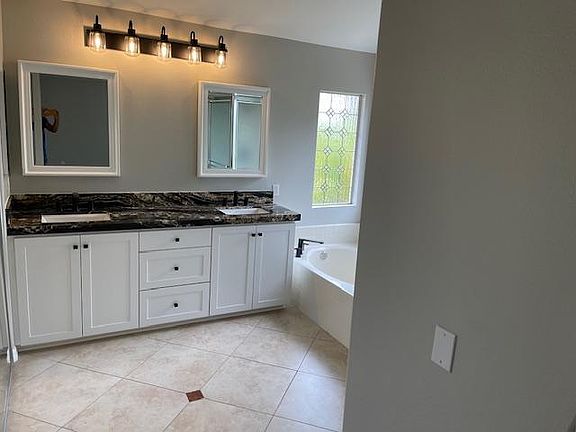 Master Bath With Soaking Tub, Seperate Shower and a Second Spacious Closet
