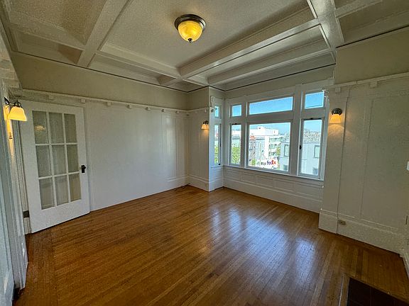 Living room windows facing Greenwich Street