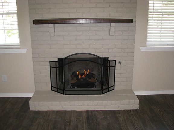 Fireplace with ventless gas logs