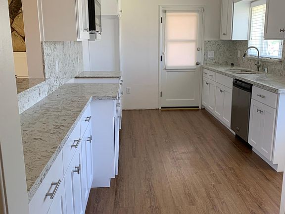 New remodeled Kitchen: includes microwave, dishwasher, and garbage disposal.