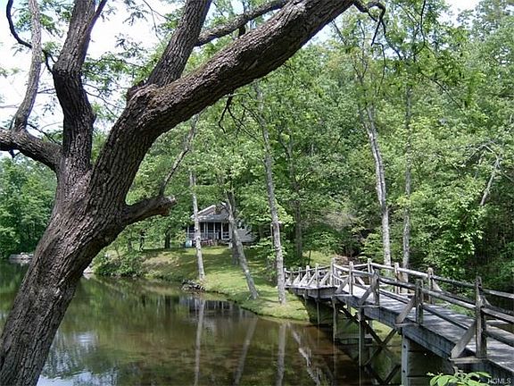 FootBridge over stream to Cottage