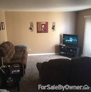 Living Room with Doors to Private Patio
