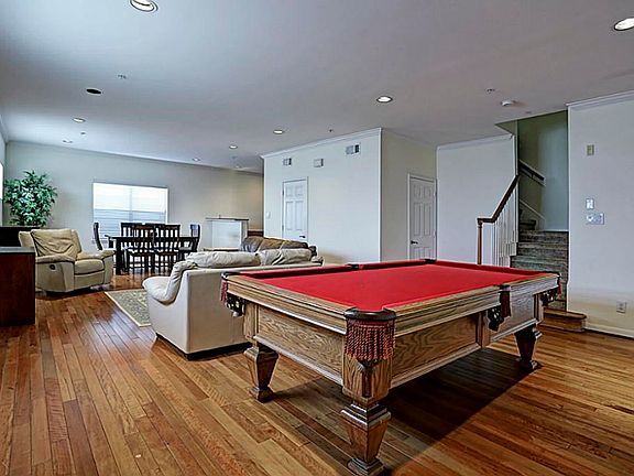 Open concept living space with room for a pool table!