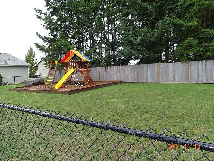 Fenced Play Area For Kids, Also Basketball Court