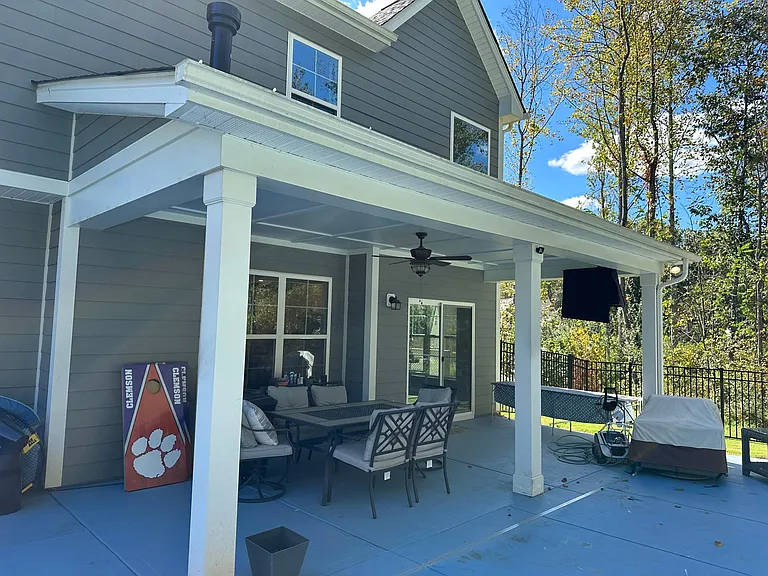 Relaxing Back Porch with t.v. and fan