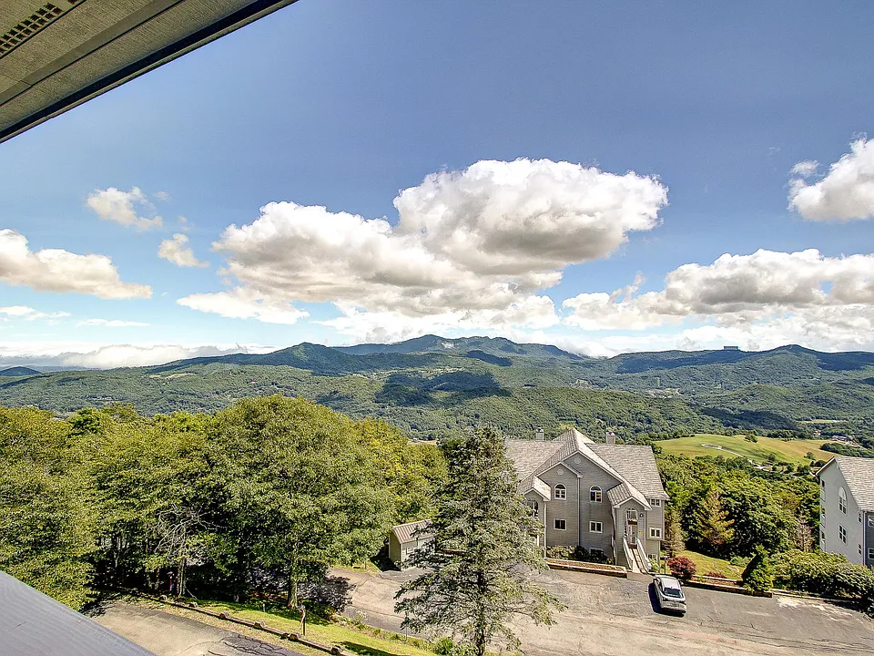 Views include Sugar Mountain and Grandfather Mountain.