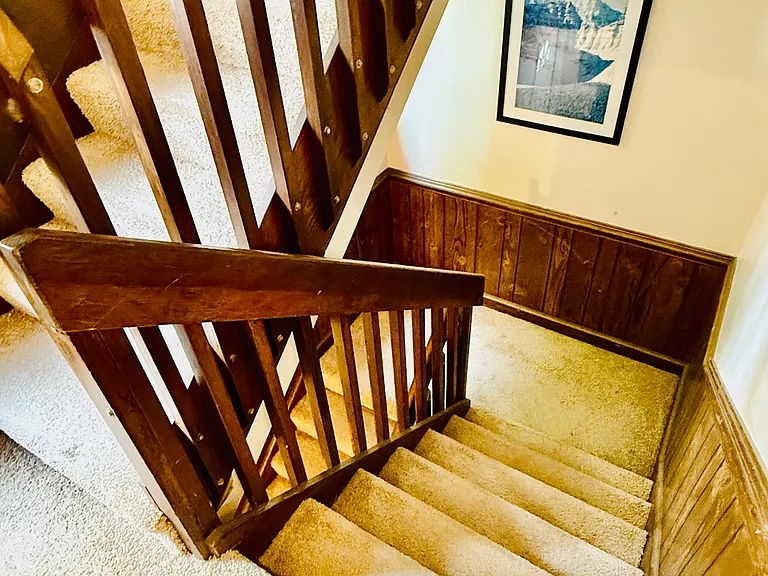 Inside stairs (looking down from second floor)