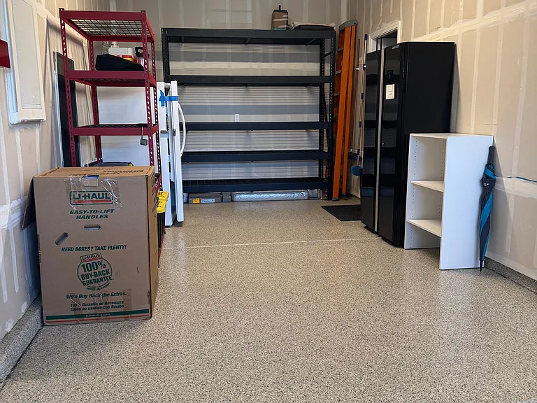 Garage w/ plenty of heavy duty shelving