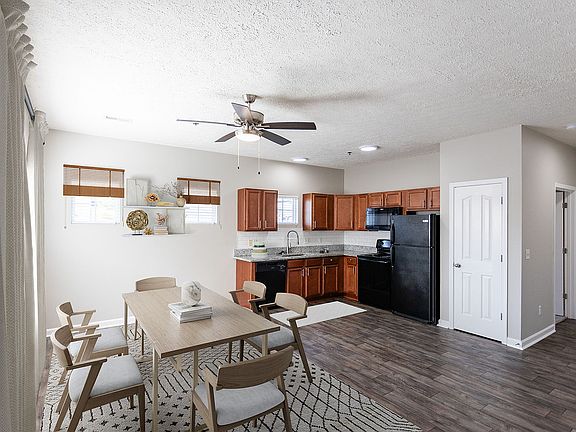 Experience modern elegance in this stylish open-concept living and kitchen area.