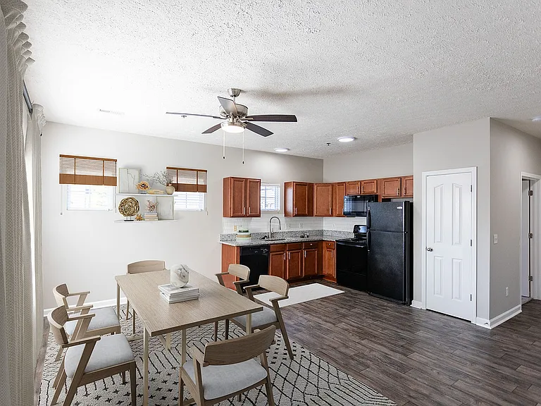Experience modern elegance in this stylish open-concept living and kitchen area.