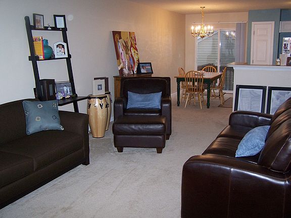 Living room open to dining and kitchen