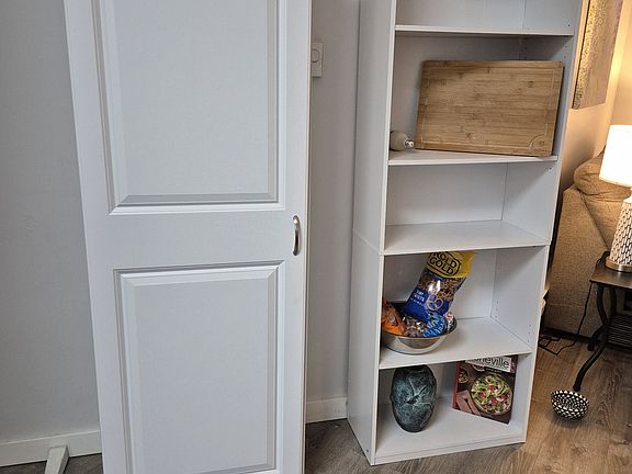 Ample storage off the Living Room in the Open Floor plan.