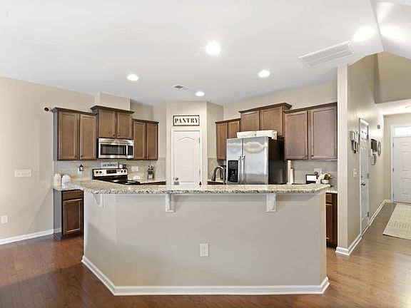 4th image of 7034 Woodsbay Ln