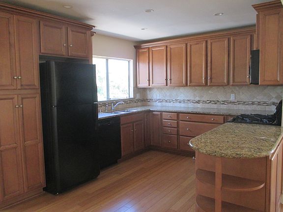 Open floor plan - kitchen, living room, dining room area all open.