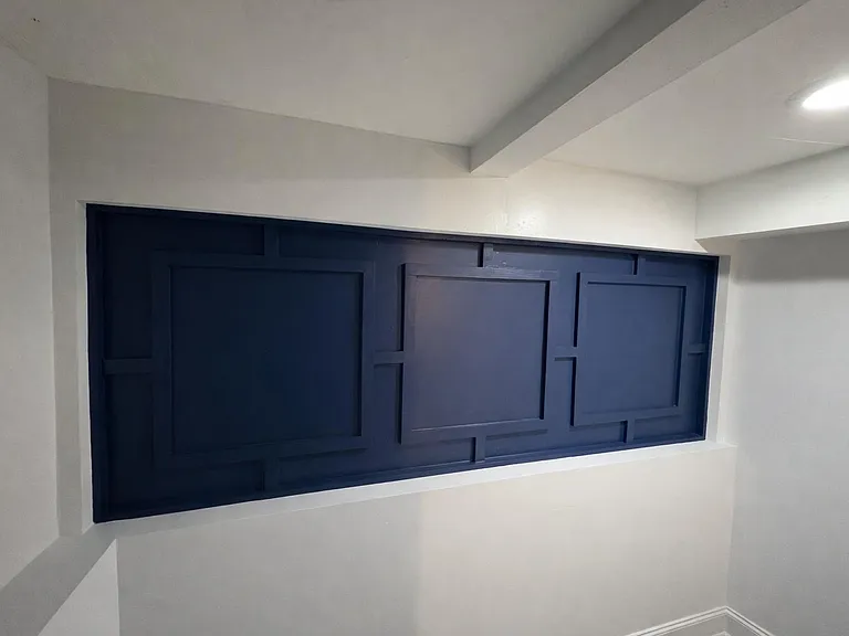 Entrance to the basement where there are is one king-sized and one full-bed-sized bedroom.