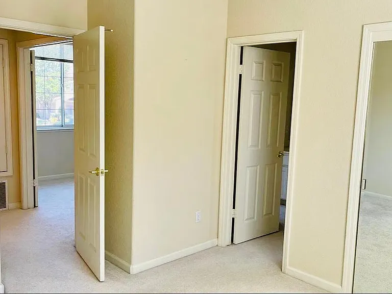 2 guest bedroom sharing the bathroom entrance view.