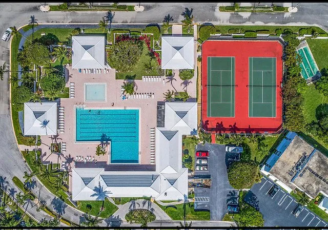 clubhouse, pool, tennis/pickleball courts/shuffle ball complex - walking distance from unit