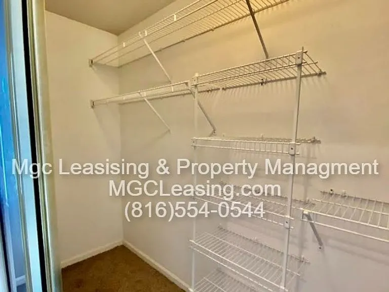 1012 NE Whispering Winds Ct — Photo 12
