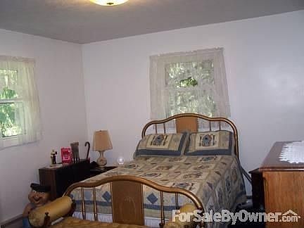 Large Master Bedroom with Large Closet : 8 Ft of Closet , East Shaded Natural Light. Over Looks Roll