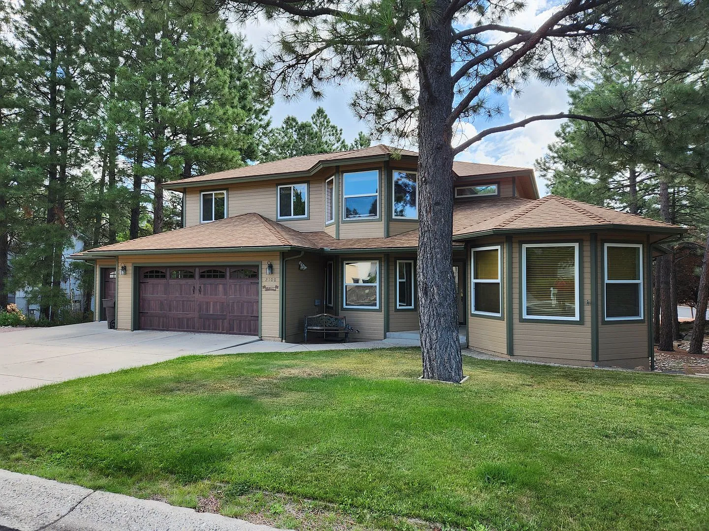 * Lease Pending * $500 Move-In Special | Country Club Home | 3-Car Garage + Basement Bonus Area — Photo 1