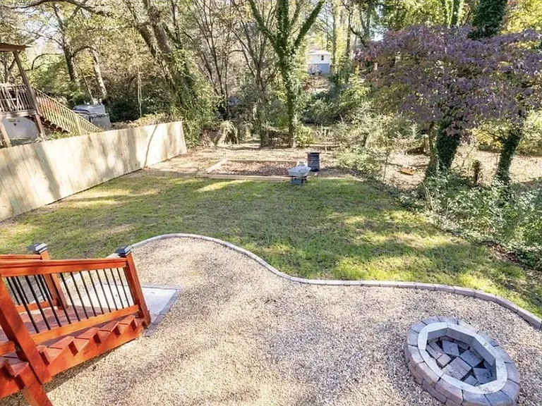 backyard with wood fire pit (right hand corner of pic)