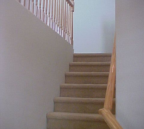 Stairs to upstairs loft, upgraded carpet throughout