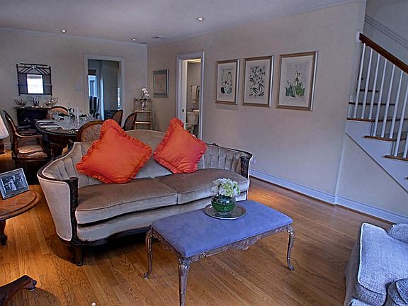 Grand and spacious formal living and dining room. Recessed lighting, and hardwood floors.