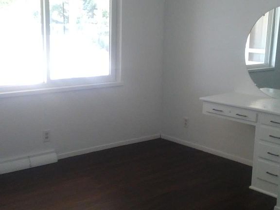 Small bedroom with built-in desk