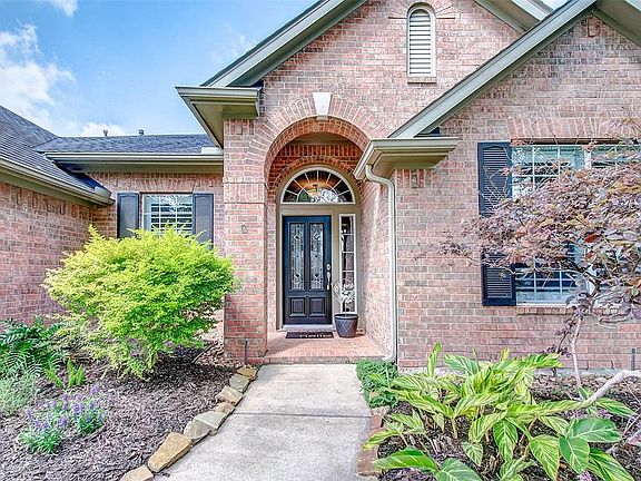 Welcome home! The beautiful 3/4 glass front door add a welcoming touch as your guests arrive.