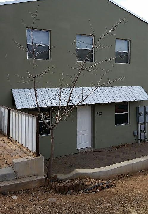 Faces High Street at Mesquite