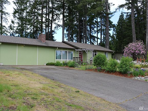 Driveway parking with additional space for trailer, RV or additional vehicle.