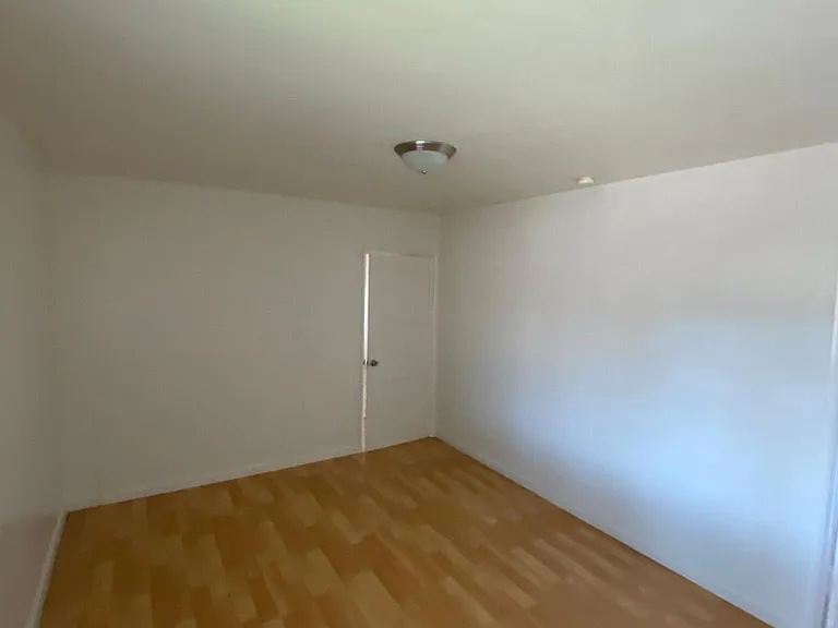 Spacious bedroom at Edison Apartments in Burbank, California.