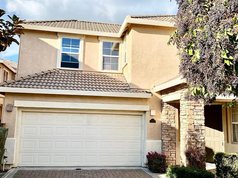 Tucked away court location, 2 car garage
