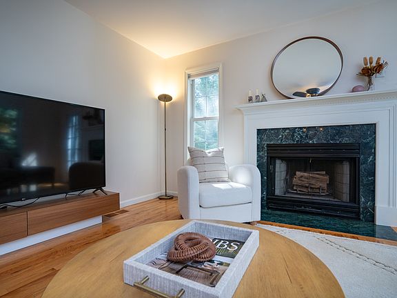 living area with 65 inch TV