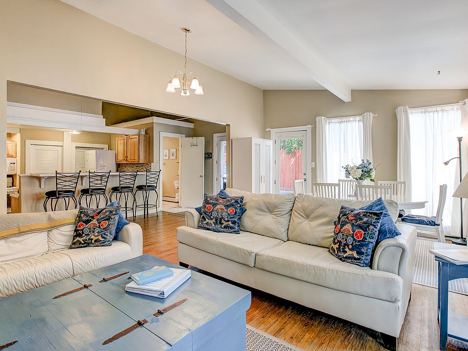 Spacious living/dining space filled with light