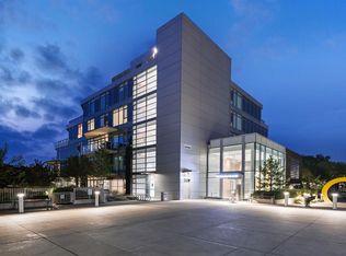 128 W Waterfront Ct SW #104, Calgary, AB T2P 1K9