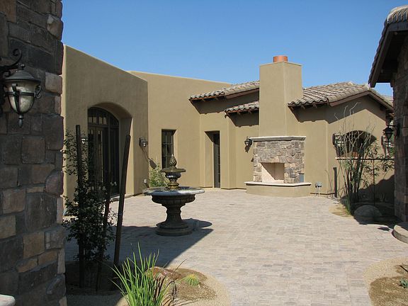 Beautiful Courtyard with Fireplace and Fountain
