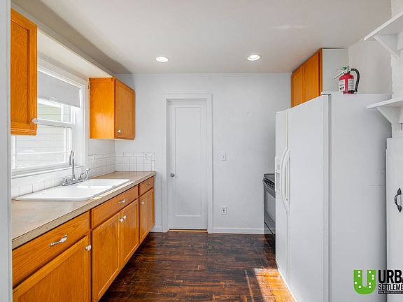 5th image of 6610 E 6th Ave