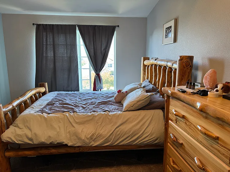 Master bedroom. Beautiful views of the green space.