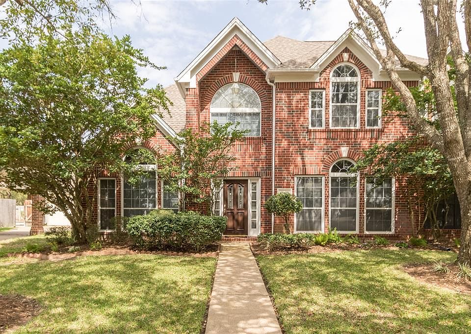 Picture perfect. High elevation and architectural details of windows add elegance to 7007 Edenbrook Ct.