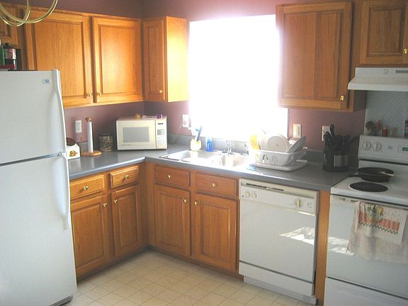 Colorful kitchen with lots of cabinet space. 