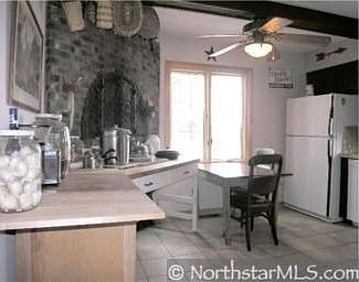 The main level country kitchen overlooks 2 ponds and features a fully function